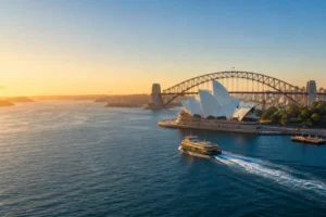 Sydney Harbour with the Opera House and Harbour Bridge at golden hour
