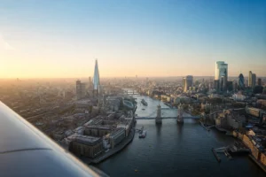 Aerial view of Tower Bridge, the River Thames and the London skyline at sunrise