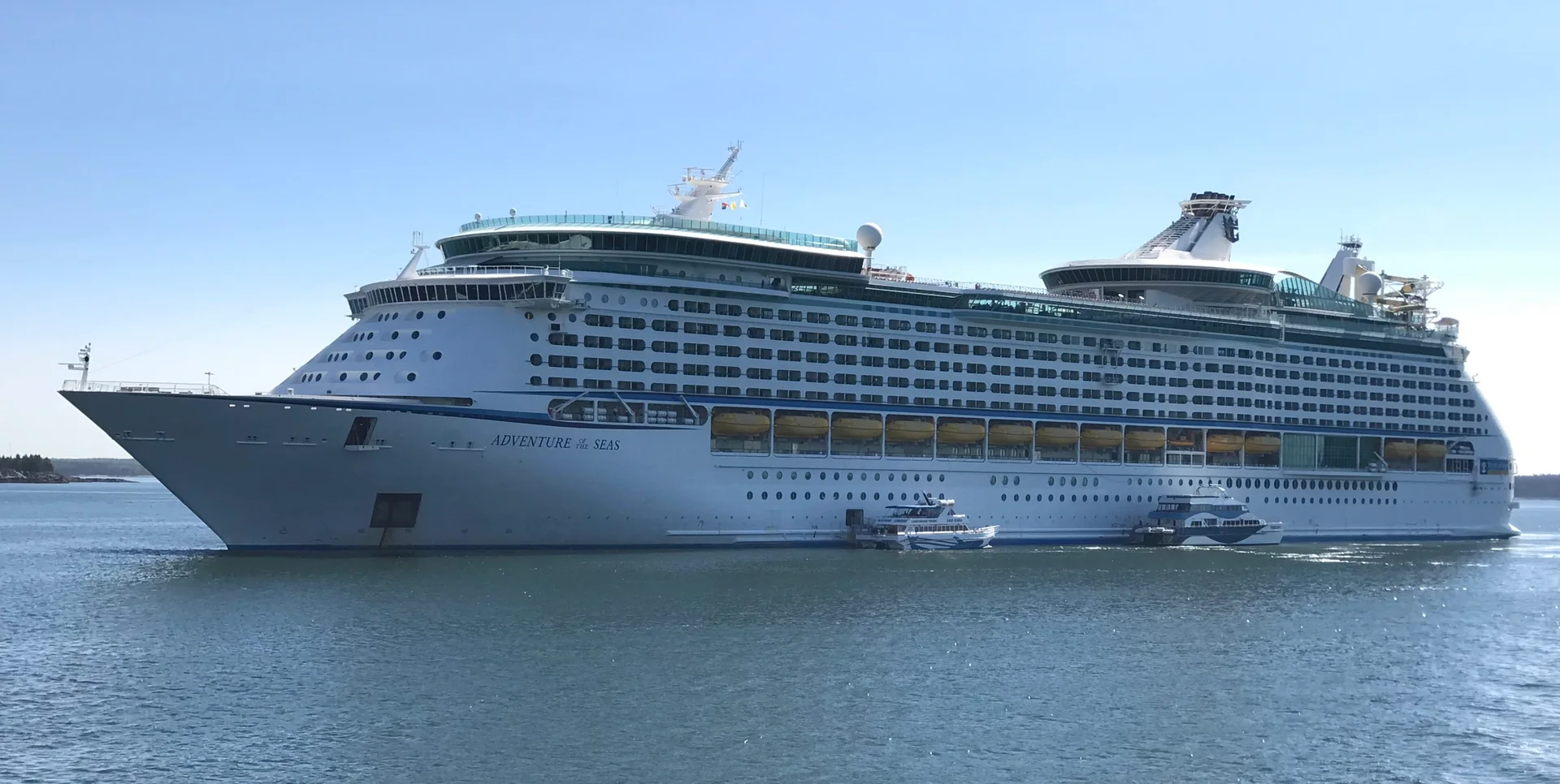 Adventure of the Seas anchored on calm blue water